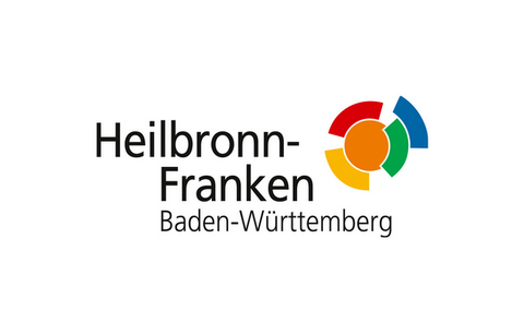 Logo der Wirtschaftsregion Heilbronn- Franken Baden-Württemberg. Text in schwarz