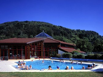 Outdoor Swimmingpool with people in there