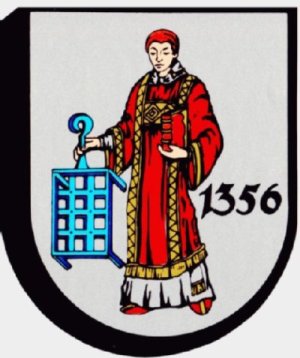 Das Niedernhaller Wappen zeigt den heiligen Laurentius dem die Niedernhaller Stadtkirche geweiht ist. Der Heilige Laurentius ist mit einem roten Gewand bekleidet und hält in der linken Hand einen Geldbeutel und in der rechten ein blaues Gitterrost. Neben ihm sieht man die Jahreszahl 1356. 